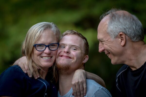 Parents and Son with Downs Syndrome